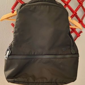 Olive green Lululemon backpack + shoe bag